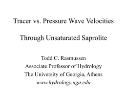 Tracer vs. Pressure Wave Velocities Through Unsaturated
